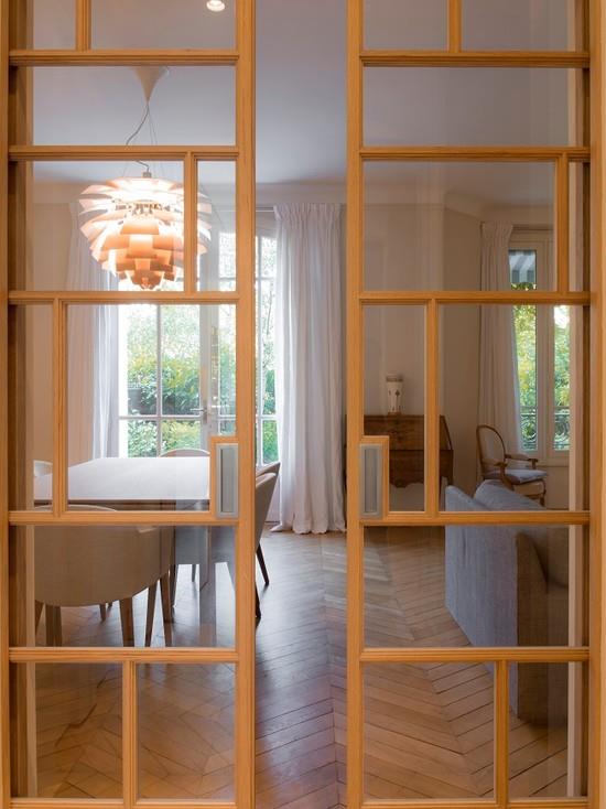 Portes vitrées coulissantes aux menuiseries en bois design Jérôme W