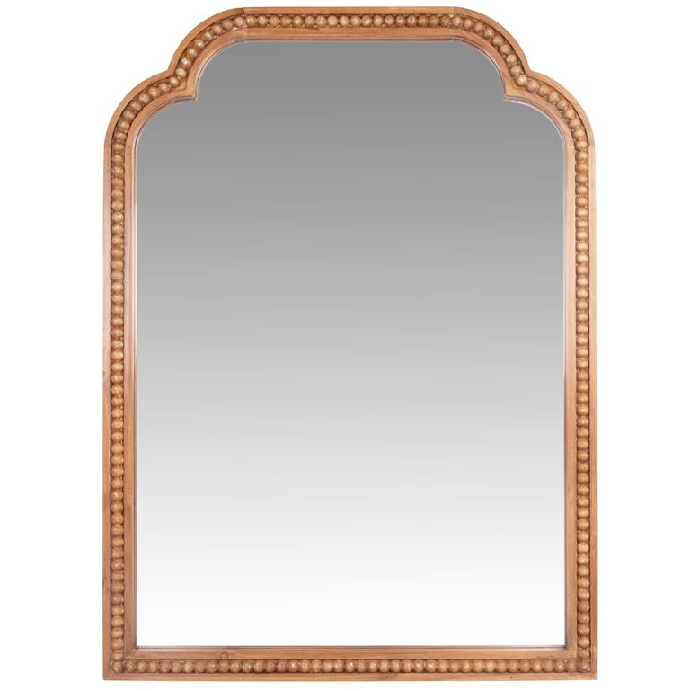 Miroir avec perles en bois de sapin gravé 66x90