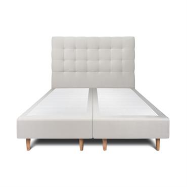 Le lit avec tete de lit capitonnée et sommier tapissier est moderne avec son large choix de tissus et de coloris. Il est robuste et durable grâce à sa structure ...