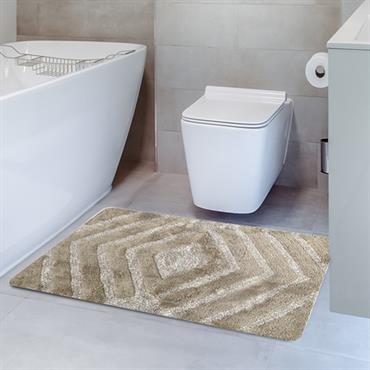 Le tapis SAGO est adapté autant pour la salle de bain qu'en temps que descente de lit. Son confort, il le doit à sa matière en majorité coton jacquard épais, ...