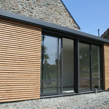 Extension bardage bois avec une toiture plate 
