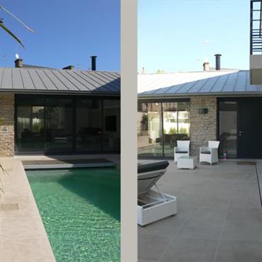 Terrasse carrelée avec piscine vert d'eau  