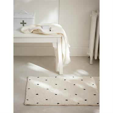 Tapis de bain à pois
