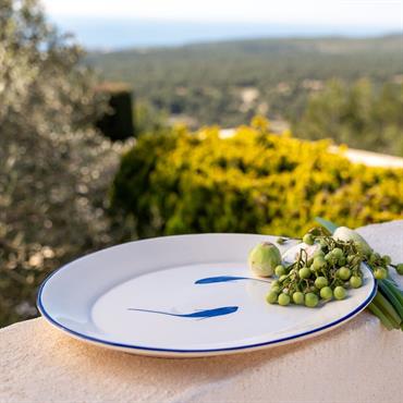 Plat de présentation ovale à motif poissons en faïence L40cm - blancANCHOVA