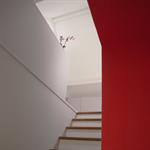 Vue de l'escalier menant à la suite parentale sous les combles