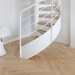 Un magnifique parquet point de Hongrie de chez Carresol habille avec élégance
