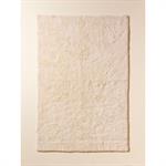 Tapis poils longs pure laine