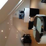 Aménagement des combles en salle télé et musique