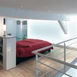 La tête de lit délimite l’espace de la chambre du loft