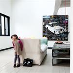 Salon avec grande hauteur de plafond et mezzanine