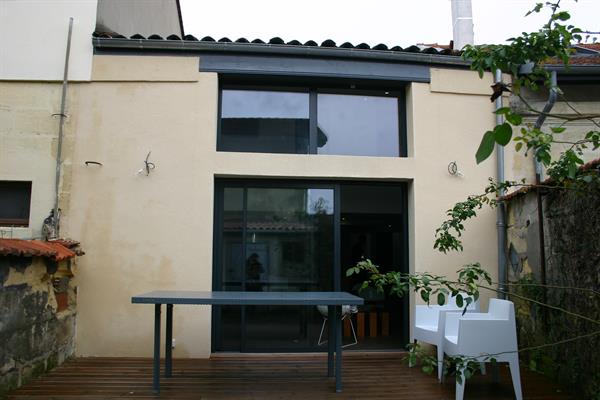 Image Recomposition de la façade donnant sur la terrasse et création de baie vitrée Cabinet d'architecture Agnès Barokel